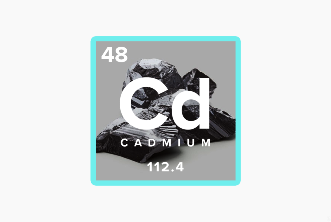 A black rock with white textDescription automatically generated
